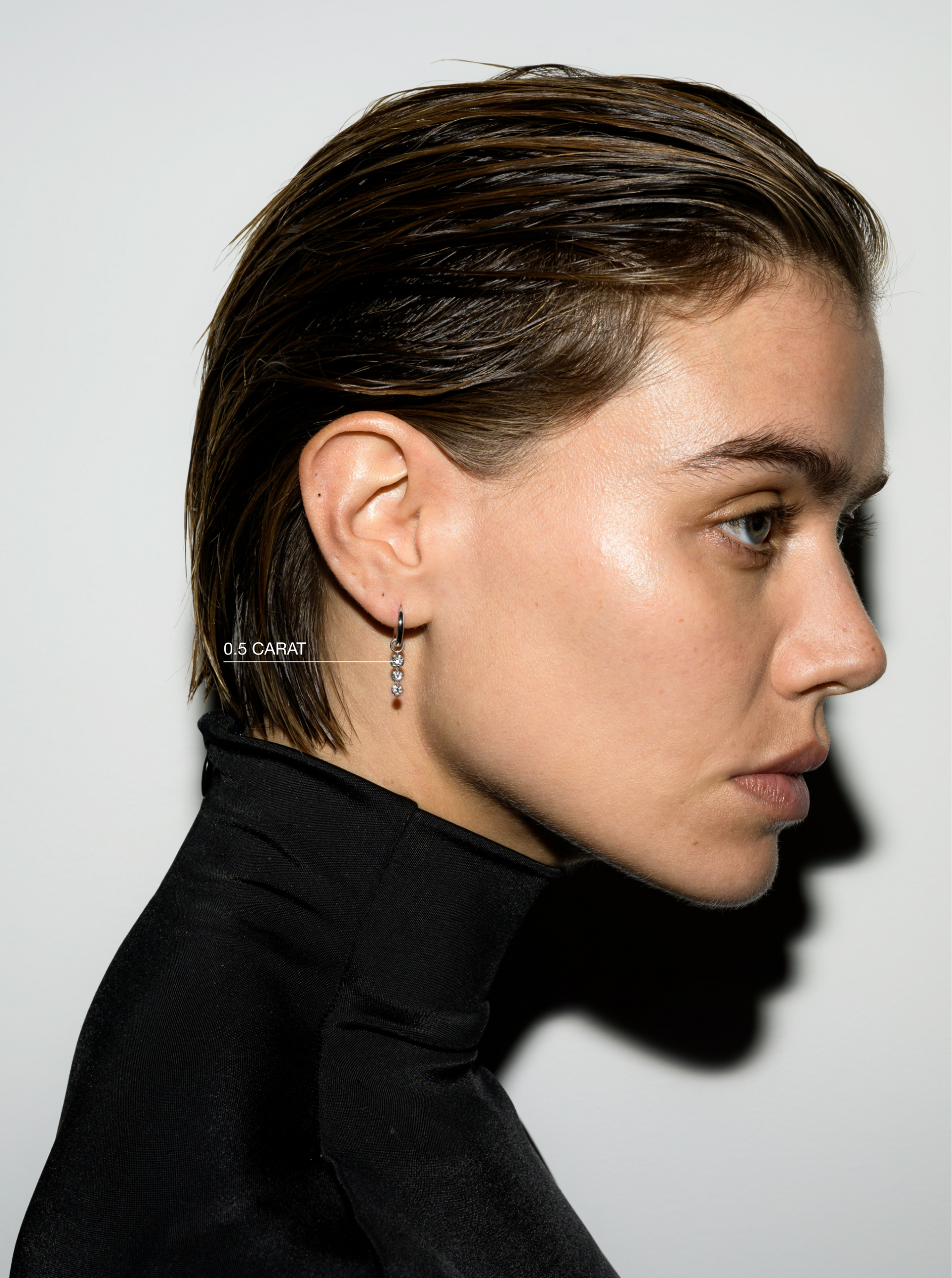 14K HUGGIE EARRING WITH FLOATING GRADUATED CHARM IN LAB DIAMOND