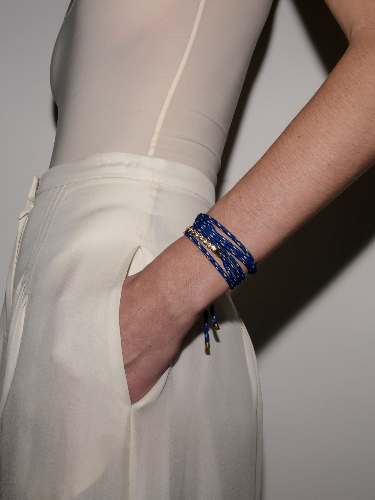 JAMES BEZEL BLEU PARACORD BRACELET, GOLD