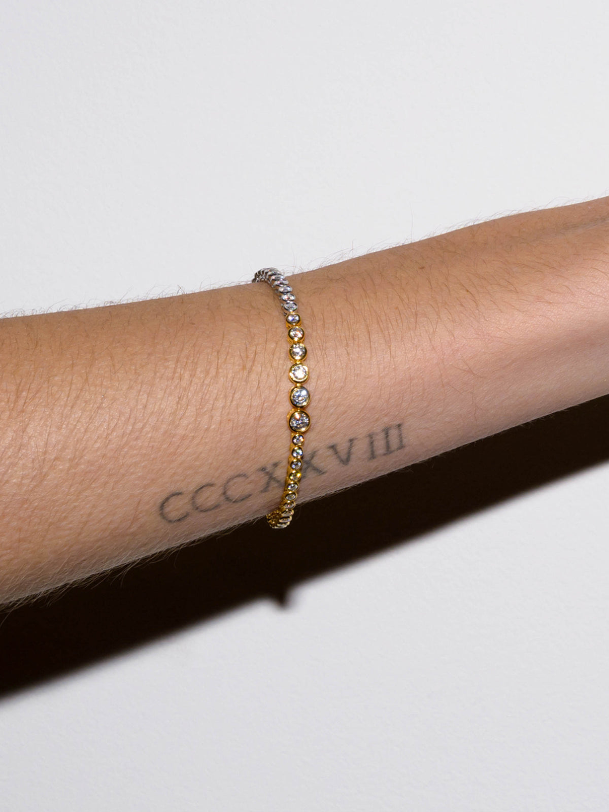 JAMES TWO-TONE GRADUATED BEZEL BRACELET IN MOISSANITE