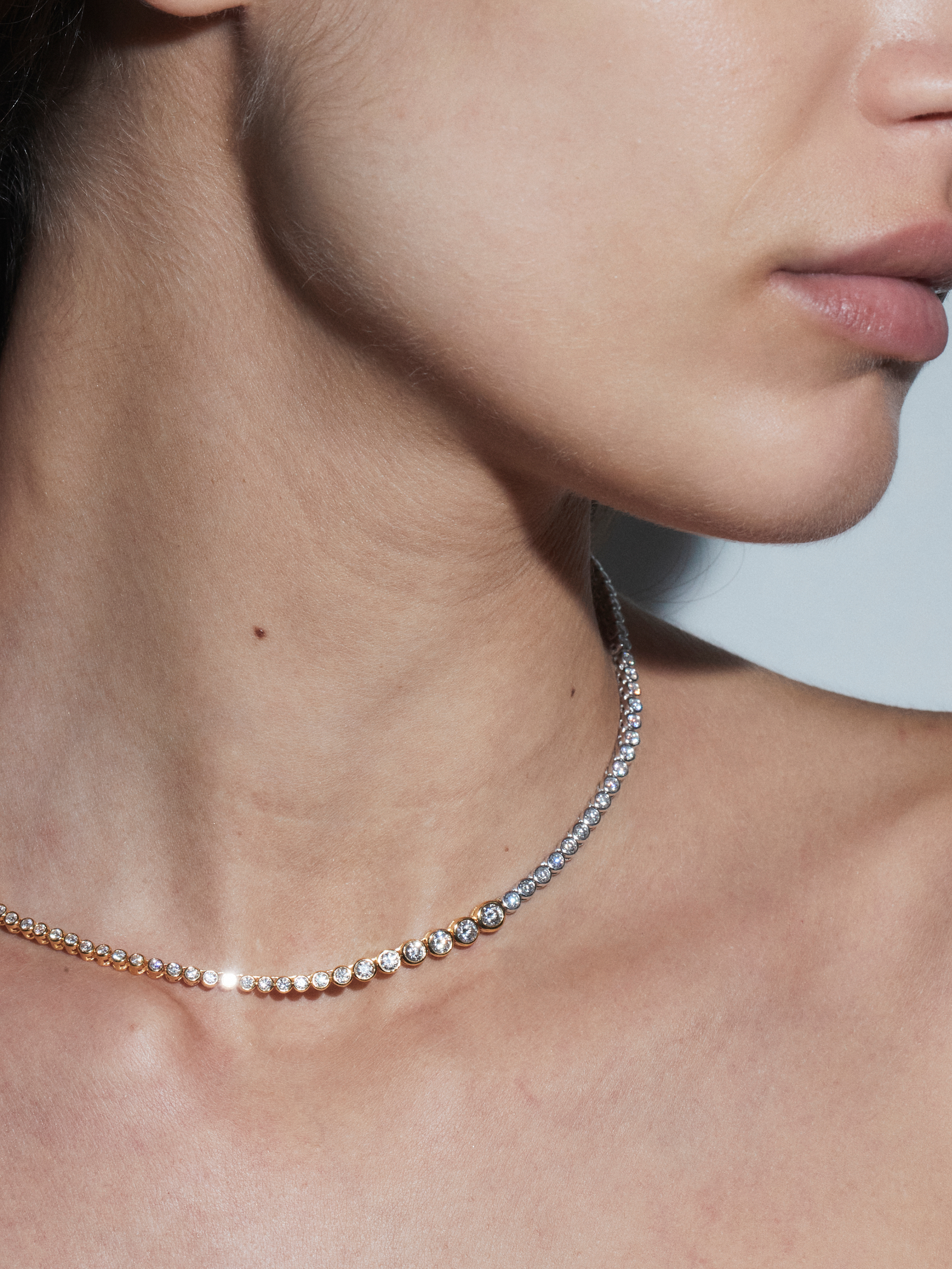 JAMES TWO-TONE GRADUATED BEZEL RIVIÈRE NECKLACE IN MOISSANITE, GOLD VERMEIL AND STERLING SILVER