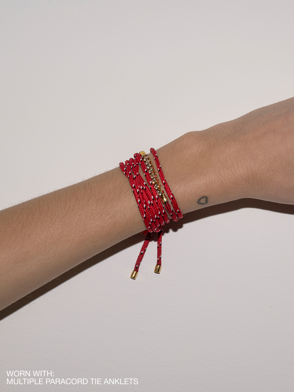 JAMES BEZEL ROUGE PARACORD BRACELET, GOLD