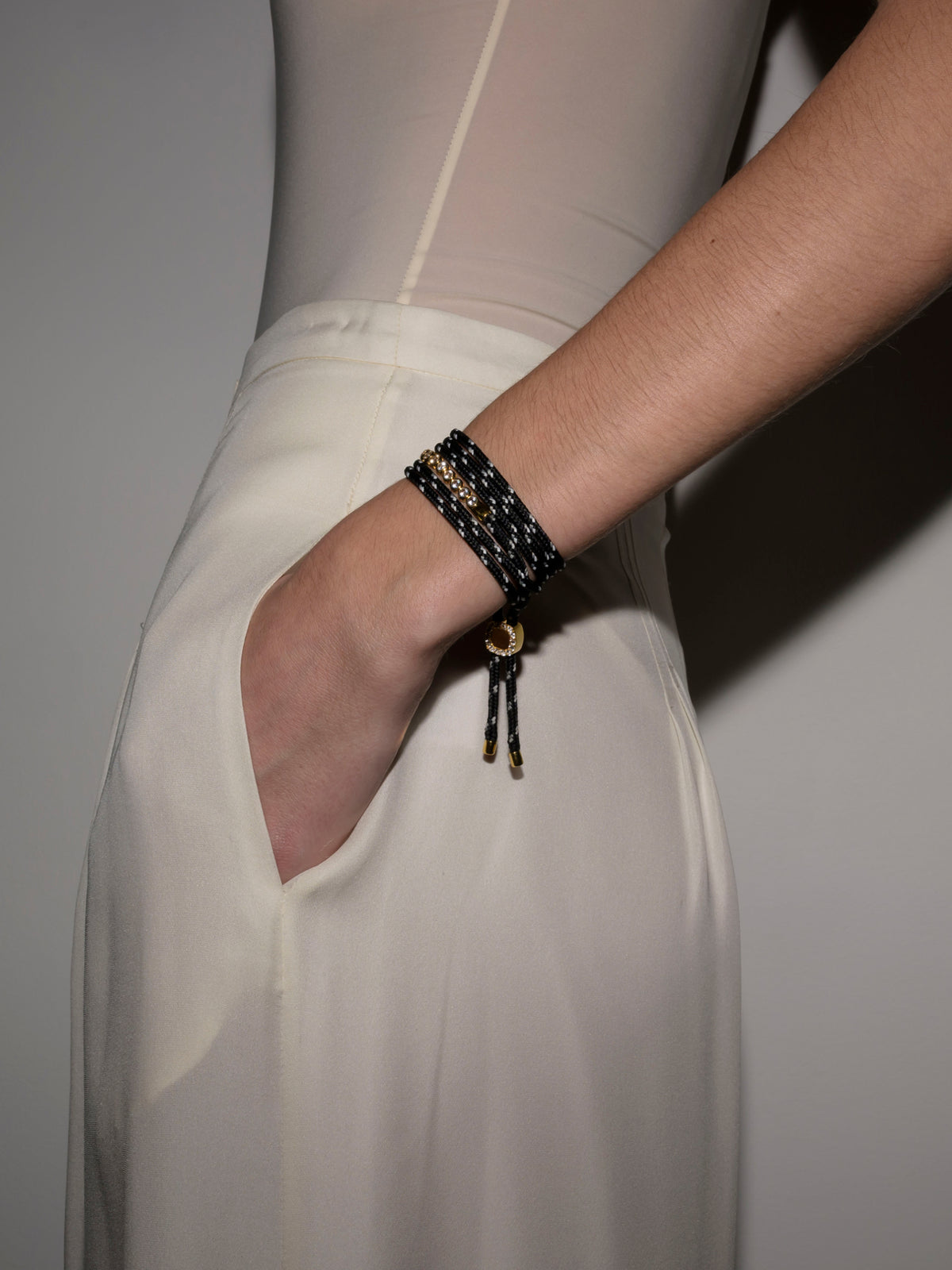JAMES BEZEL NOIR ET BLANC PARACORD BRACELET, GOLD