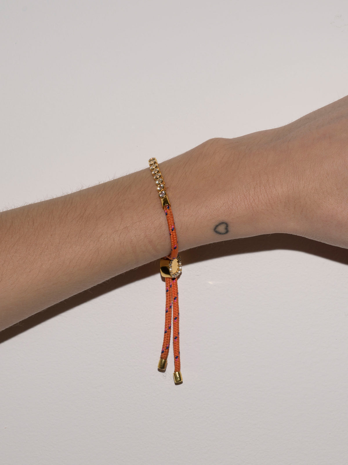JAMES BEZEL ORANGE PARACORD BRACELET, GOLD